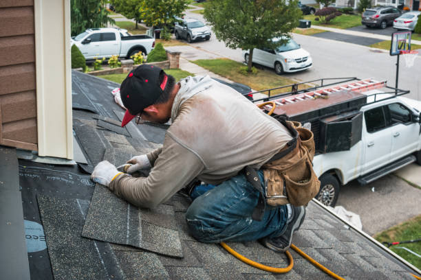 Professional Roofing technician working in Woodstock, IL